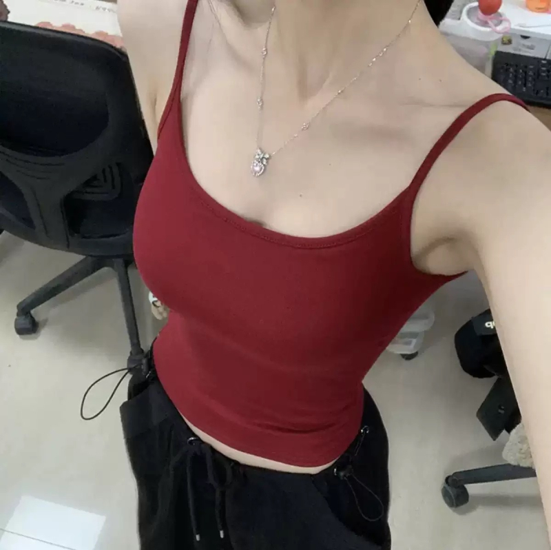 Moteriška kamizolė su putų pagalvėle; apvalus kaklo iškirpimas; sling stilius, universalus; 90–95% medvilnė; audinio svoris 141–160 g/m².