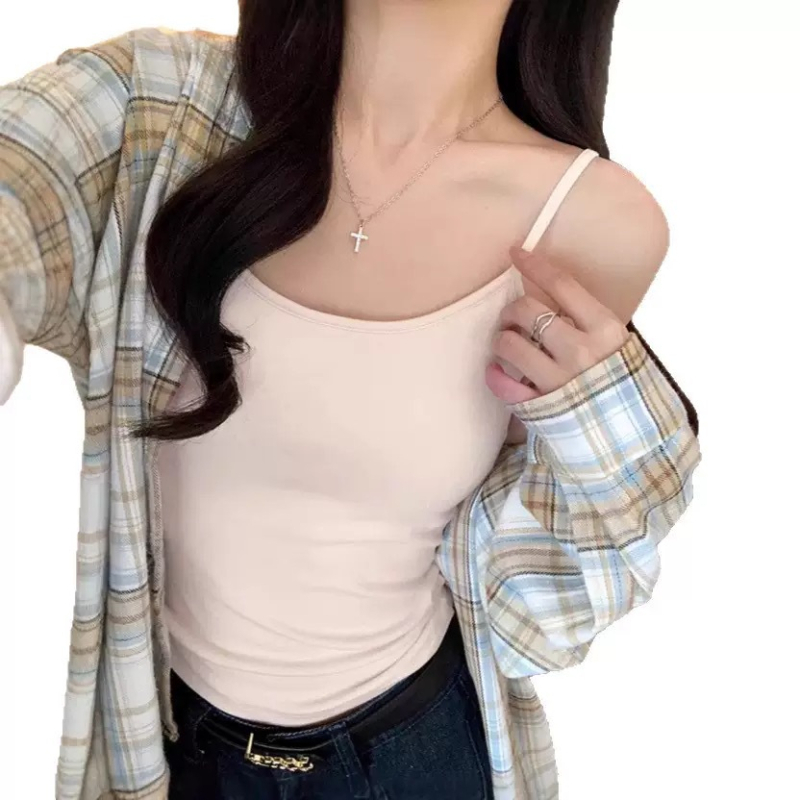 Moteriška kamizolė su putų pagalvėle; apvalus kaklo iškirpimas; sling stilius, universalus; 90–95% medvilnė; audinio svoris 141–160 g/m².