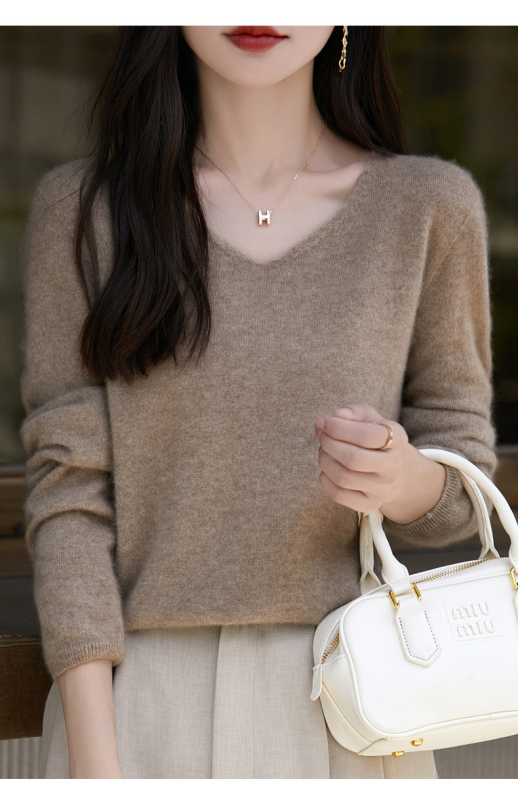 Moteriškas vilnos megztinis 95%+, V formos kaklo, laisvas kirpimas, ilgos rankovės, ilgis 50–65 cm