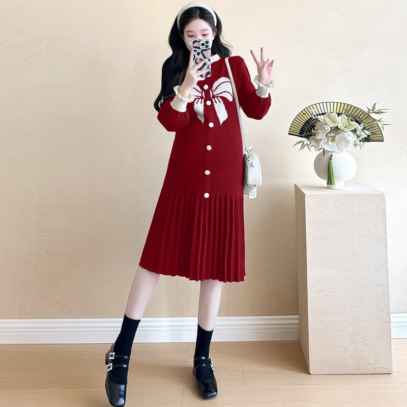 Plisuota midi suknelė su stoviu kaklu, ilgos rankovės, medvilnės-elastano mišinys (70–80% medvilnė, <30% elastanas), mazgų raštas