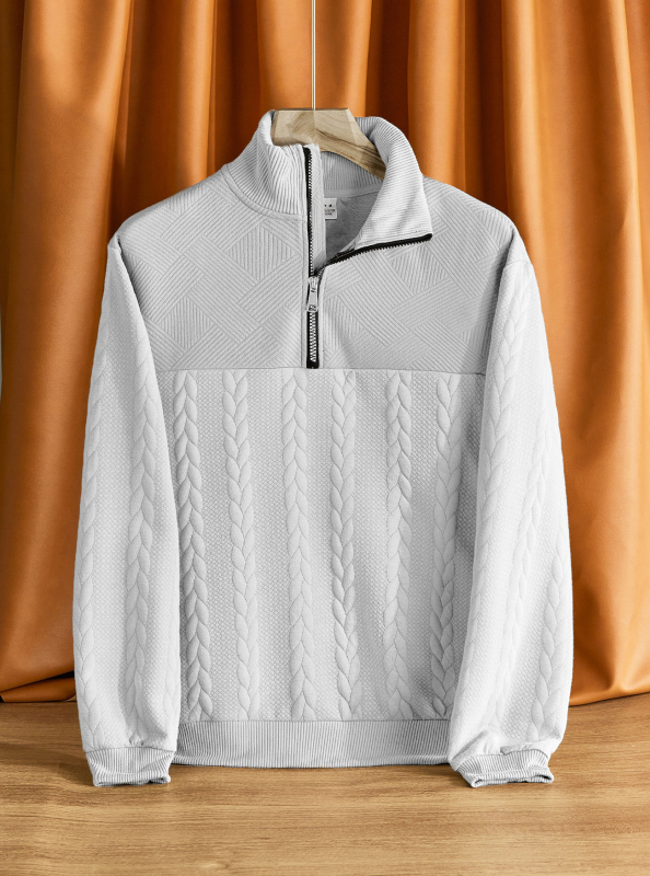 Hanorac tricotat cu guler înalt și fermoar, croială lejeră, jacquard 300 g, 95% poliester, 5% elastan, mâneci lungi, detaliu jacquard, primăvară-toamnă