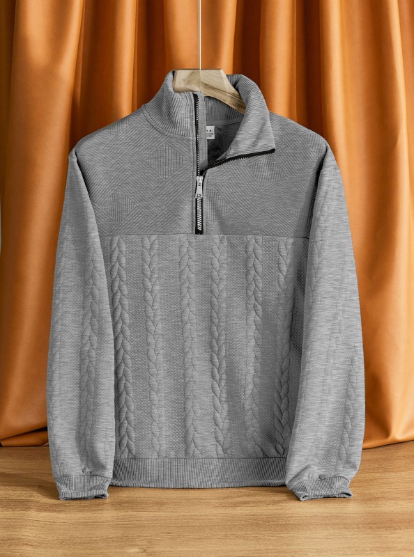 Hanorac tricotat cu guler înalt și fermoar, croială lejeră, jacquard 300 g, 95% poliester, 5% elastan, mâneci lungi, detaliu jacquard, primăvară-toamnă