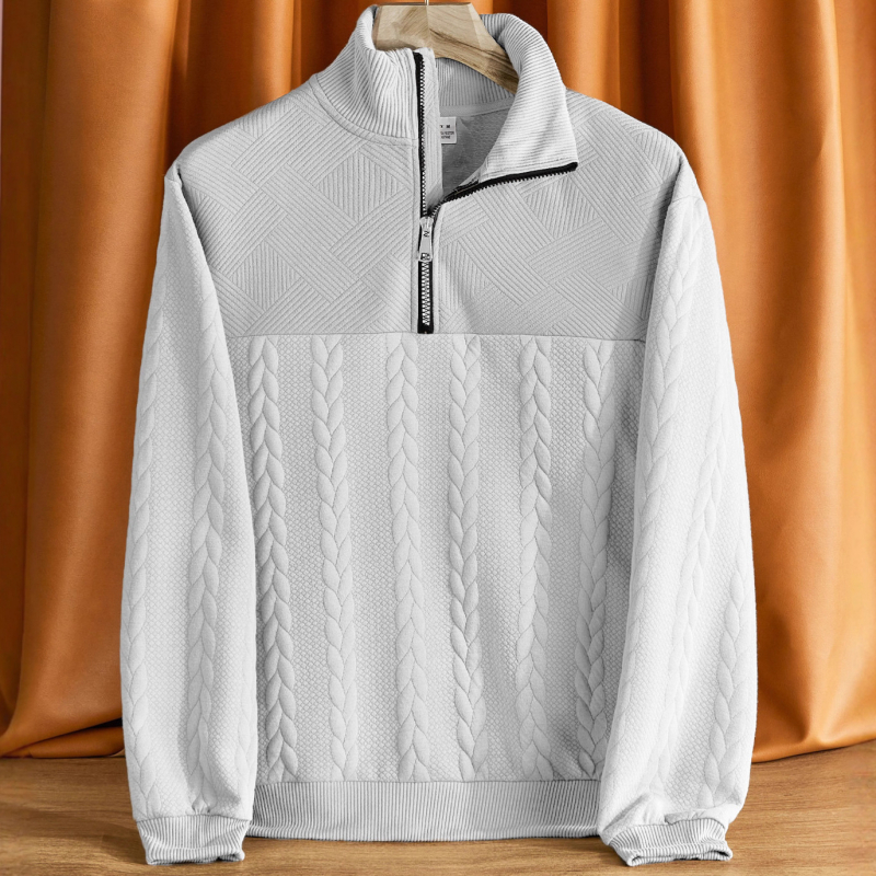 Hanorac tricotat cu guler înalt și fermoar, croială lejeră, jacquard 300 g, 95% poliester, 5% elastan, mâneci lungi, detaliu jacquard, primăvară-toamnă