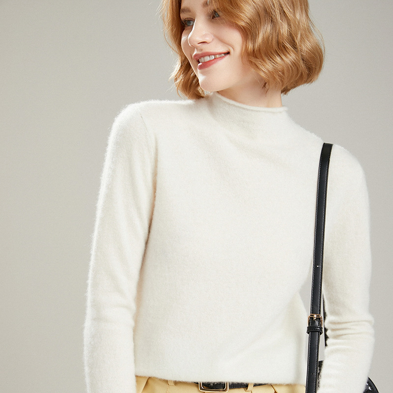 Moteriškas vilnos džemperis su stovinčia apykakle, vienarūšis raštas, ilgomis rankovėmis, siauras kirpimas (Sudėtis: vilna >95%; Raštas: vienarūšis; Apykaklė: stovinti; Rankovės: ilgos; Kirpimas: siauras)