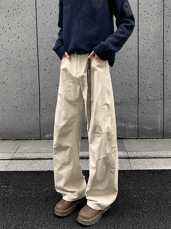 Traperice u američkom street-stilu, retro plisirane detalje, patchwork paneli i oprani završni ton, ležerni kroj, srednji struk, unisex, velika veličina, za jesen