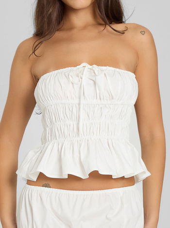 Dviejų dalių komplektas: be rankovių viršus ir ilga sijona su klostuotu liemeniu; polieteris; vasara 2025; biuro stilius