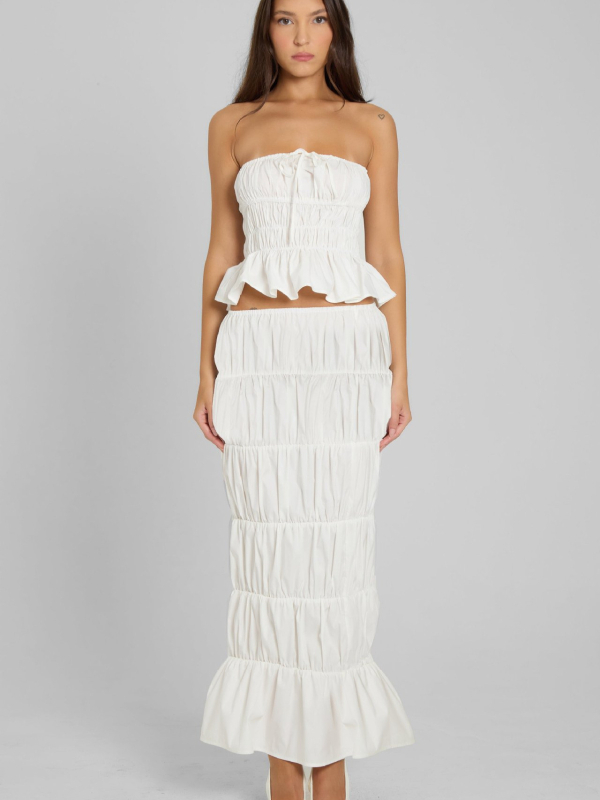 Dviejų dalių komplektas: be rankovių viršus ir ilga sijona su klostuotu liemeniu; polieteris; vasara 2025; biuro stilius