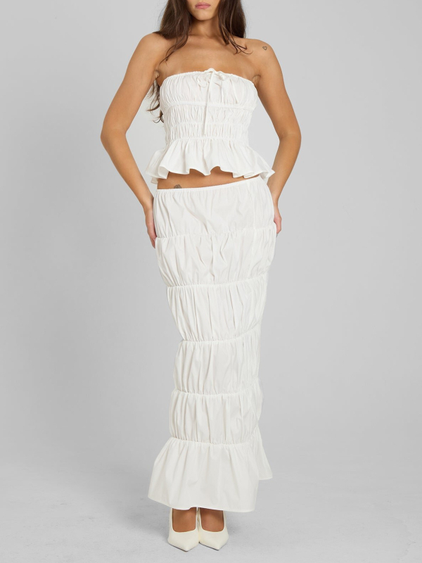 Dviejų dalių komplektas: be rankovių viršus ir ilga sijona su klostuotu liemeniu; polieteris; vasara 2025; biuro stilius