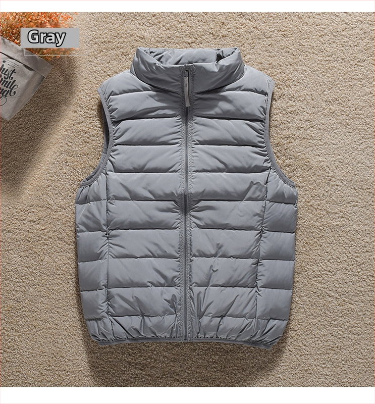 Sievietēm plāna dūnu veste ar augstu apkakli un rāvējslēdzēju, pildījums: pīļu dūnas, slaids siluets, garums 50–65 cm.