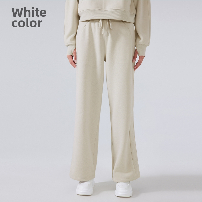 Moterų žieminės sportinės kelnės su aukštu liemeniu, laisvas kirpimas, medvilnės mišinio audinys (28% medvilnė), be pamušalo, išlaiko šilumą, tinka bėgimui ir treniruotėms