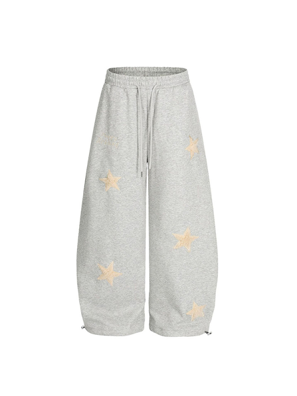 Női sportos casual nadrág csillag hímzett foltokkal, pamut anyag, elasztikus derék, lazán szabott, széles szárú, ősz 2025