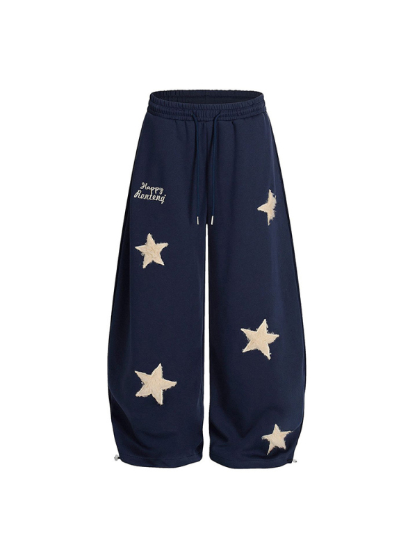 Női sportos casual nadrág csillag hímzett foltokkal, pamut anyag, elasztikus derék, lazán szabott, széles szárú, ősz 2025