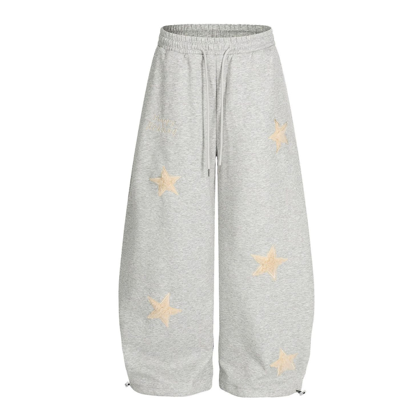 Női sportos casual nadrág csillag hímzett foltokkal, pamut anyag, elasztikus derék, lazán szabott, széles szárú, ősz 2025