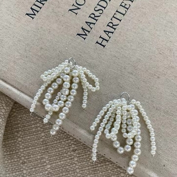 Jalatsite kinnitus pärlpaelaga, helmidega ja tutiga – aksessuaar jooksjatele ja igapäevastele jalanõudele