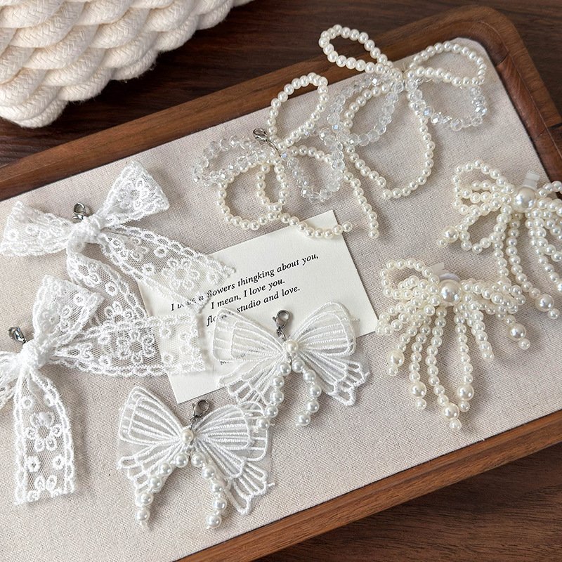 Jalatsite aksessuaar pärli ja paelaga – Mudel 26022, naiste aksessuar Mishang Premium Products, kõikide hooaegade jaoks