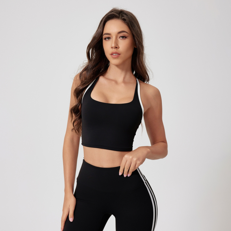 Moterų sportinis biustas bėgimui ir fitnesui su fiksuotomis dvigubomis peties juostelėmis, 3/4 kupra, vidutinio formavimo kupra, pagrindinis audinys nailonas 75%, įdaila nailonas 75%.