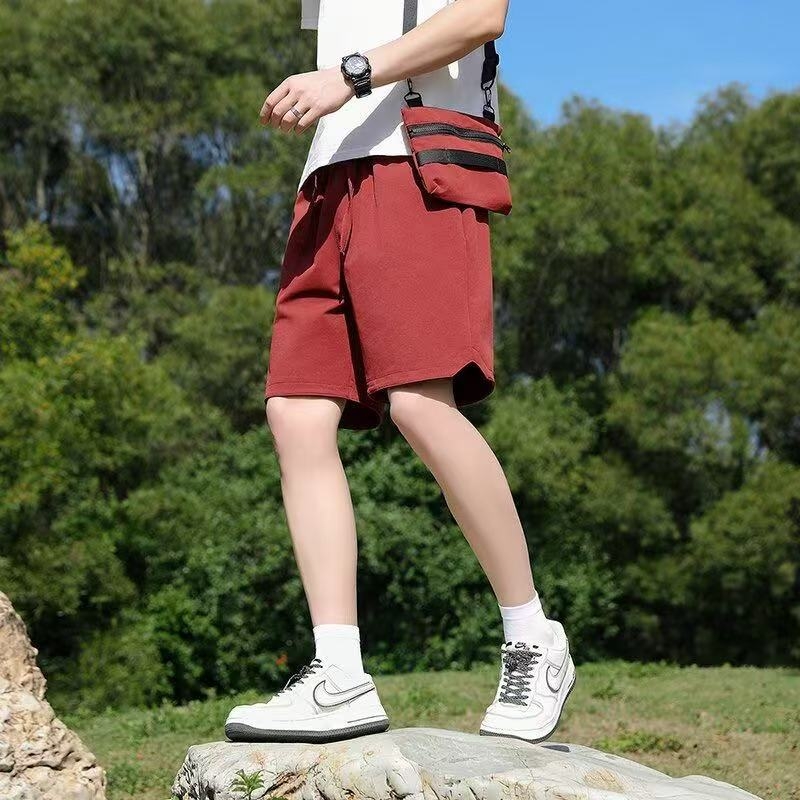 Pánske športové šortky, rýchloschnúce, voľný rovný strih, 100% polyester, dĺžka po kolená