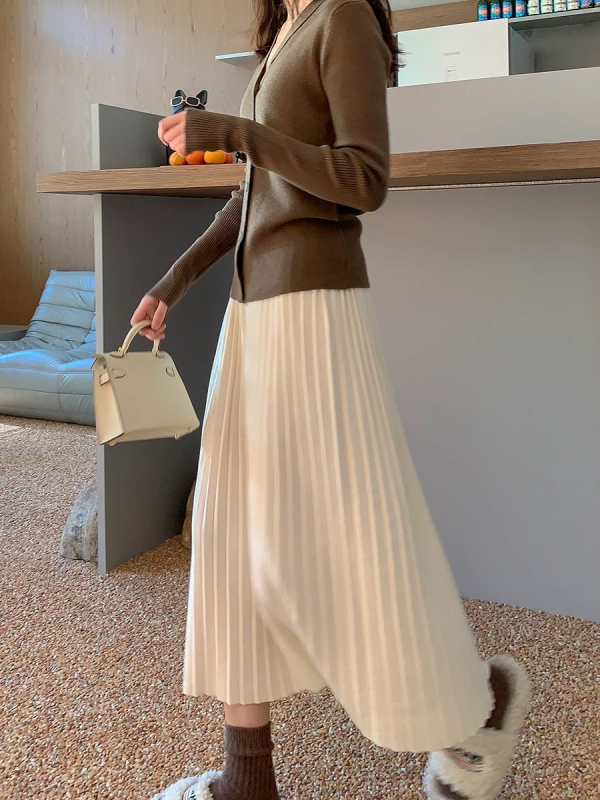 Jesen-zimska off-white vunena pletiva suknja s accordion plisiranjem, midi duljine, elastični visok pojas, A-linija, za sitne figure