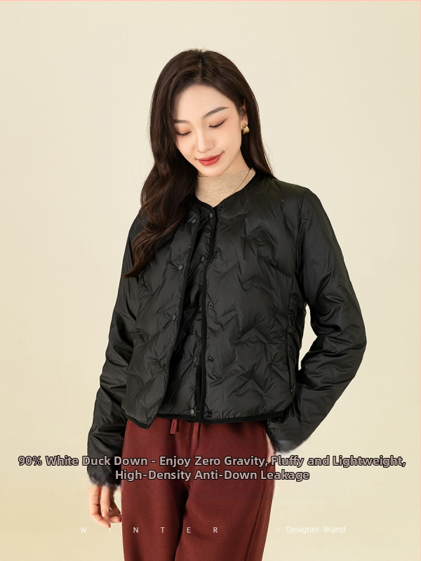 Sieviešu dūnu jaka, šaura piegriezums, pildījums 86–90% dūnu, vidēja biezuma, poliestera audums, garums 50–65 cm