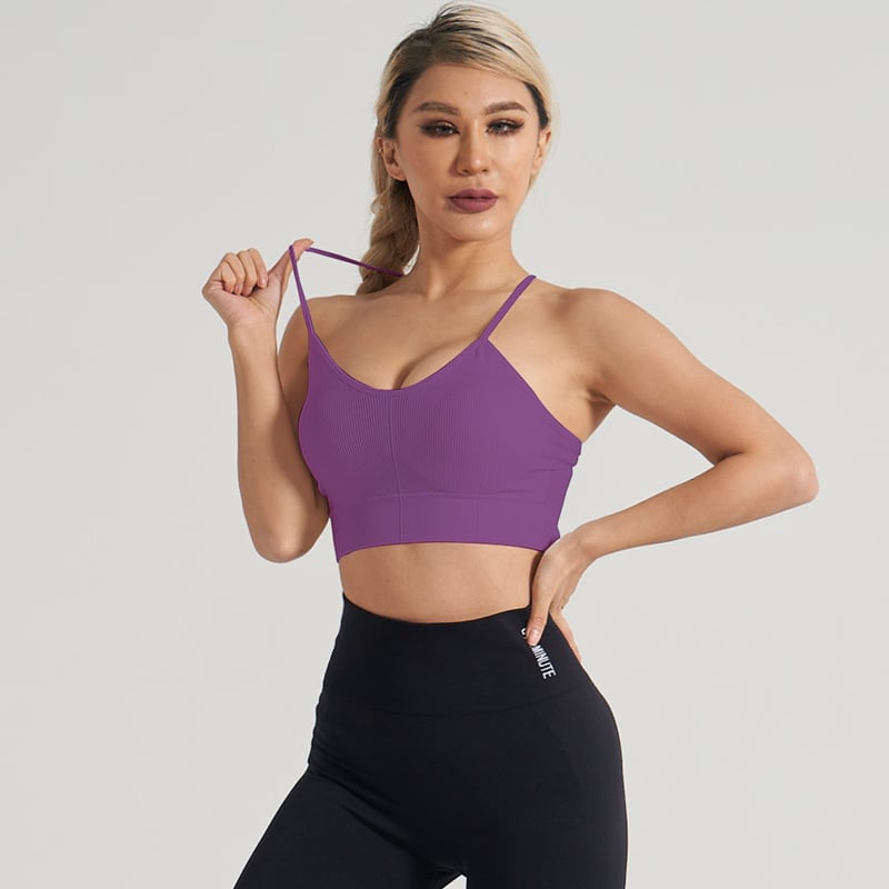 Joga viršelis su natūraliaus jausena, šoninis krūtinės palaikymas, sportinis liemenė su kryžmine nugara ir smūgių sugeriamasis dizainas; Audinys: brokatas spandeksas; Medžiaga: nailonas; Krojus: siauras; Trumpas ilgis; Įtraukti krūties pagalbliai