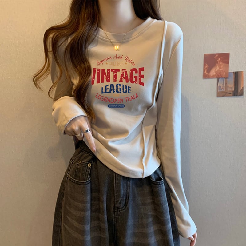 Moteriški marškinėliai iš 100% medvilnės, apvaliu kaklu, ilgomis rankovėmis, siauras kirpimas ir siuvinėjimas