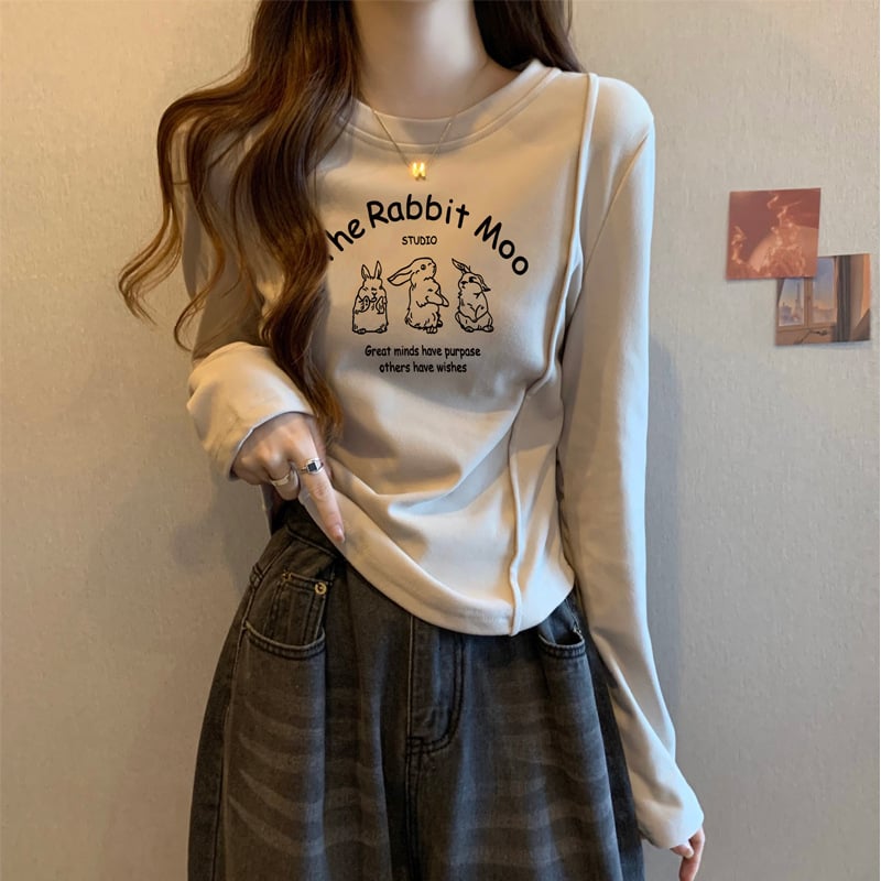 Moteriški marškinėliai iš 100% medvilnės, apvaliu kaklu, ilgomis rankovėmis, siauras kirpimas ir siuvinėjimas