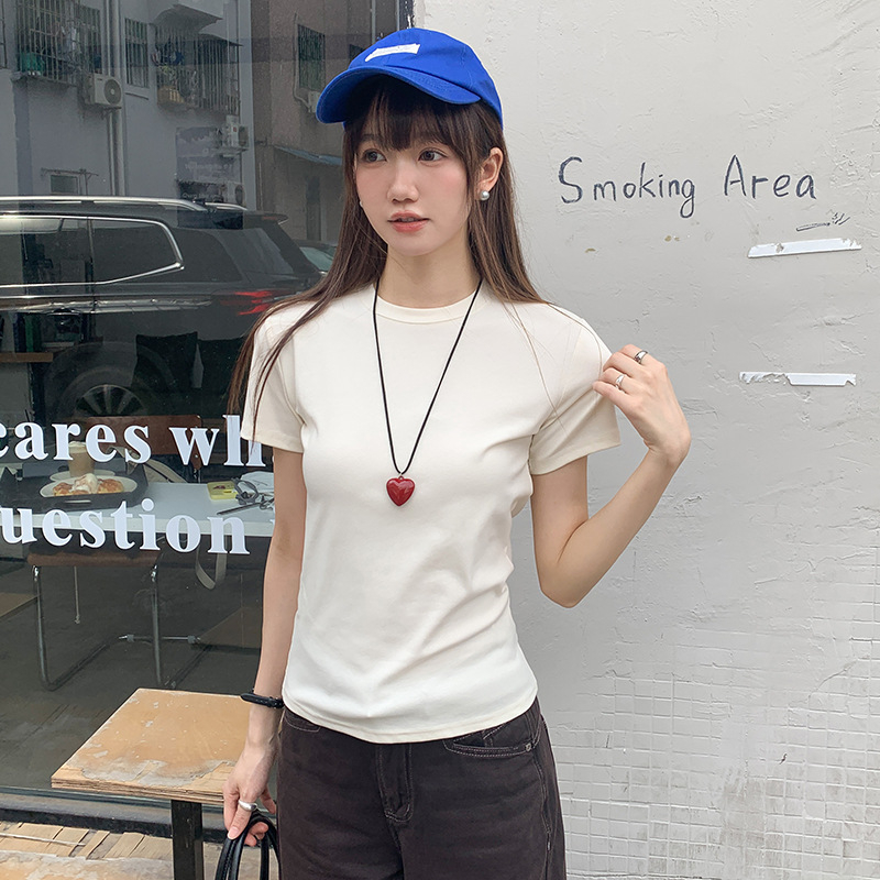 Notika moterų marškinėliai su trumpom rankovėm, slim fit, apvali kaklo linija, medvilnės-elastano mišinys (92% medvilnė, 8% elastanas), vienos spalvos, patchwork dizainas, įprastas ilgis, vasara 2025