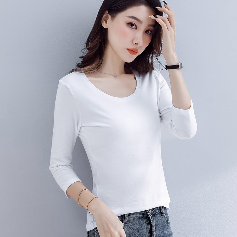 Pamuk majica s 3/4 rukavima, uskog kroja, okrugli izrez, srednja duljina, 95% pamuk i elastan ispod 30%.