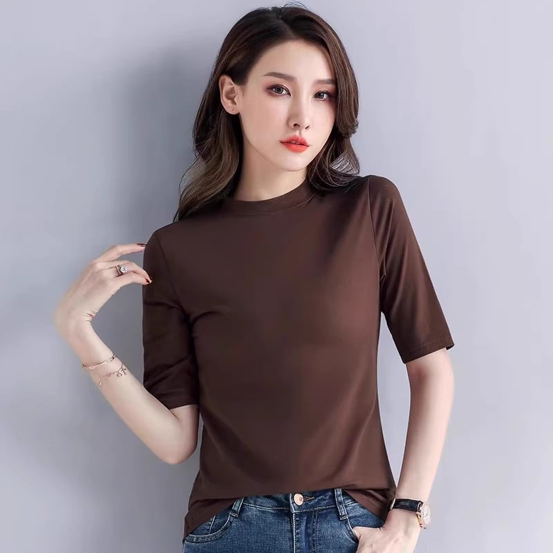 Pamuk majica s 3/4 rukavima, uskog kroja, okrugli izrez, srednja duljina, 95% pamuk i elastan ispod 30%.