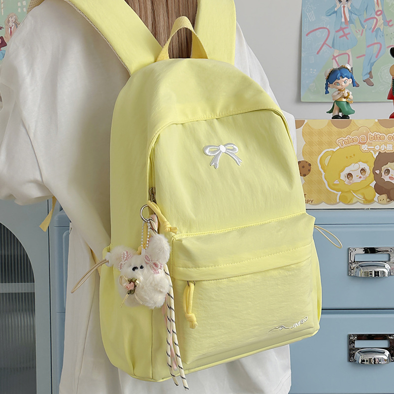 Női masnis hátizsák - nylon, kapacitás 20 L alatt, illeszkedik 10 hüvelykes laptophoz, görbült vállpántok, városi minimalista stílus