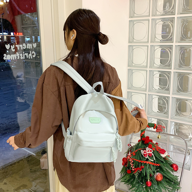 Лека нейлонова раница за ученици, унисекс, дишаща, намалява натоварването, извити презрамки, училищен стил, зима 2025