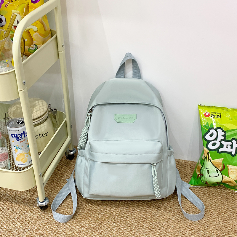 Лека нейлонова раница за ученици, унисекс, дишаща, намалява натоварването, извити презрамки, училищен стил, зима 2025