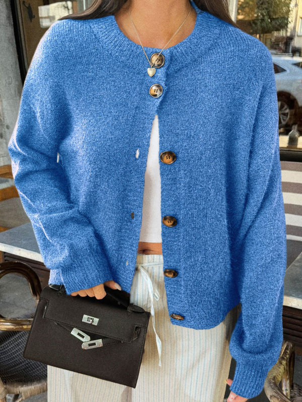 Ζακετάκι πλεκτό από μαλλώδες ύφασμα με μείξη πολυεστέρα 70–80% και νάιλον <30%, μακριά μανίκια, στρογγυλός λαιμός, κούμπωμα με κουμπιά