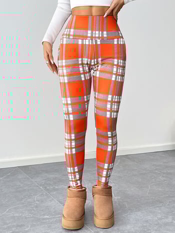 2025 m. ryškiaspalvės, languotos, ėriuko vilnos, aukšto juosmens moteriškos tamprės, priglundančios ir šiltos, tinkamos dėvėti viršutinius drabužius.