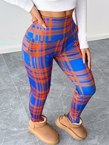 2025 m. ryškiaspalvės, languotos, ėriuko vilnos, aukšto juosmens moteriškos tamprės, priglundančios ir šiltos, tinkamos dėvėti viršutinius drabužius.