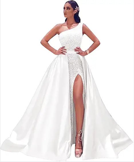 Večernja haljina bez naramenica, s prorezom i otvorenim leđima; tkanina: poliester s elastanom i regenerirana vlakna celuloze; batik postupak