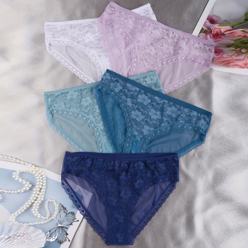 Sieviešu mežģīnē biksītes ar vidukļa vidējo līmeni, ziedu raksts, neilona audums, ķermeņa formēšana, kokvilnas odere starp kājām