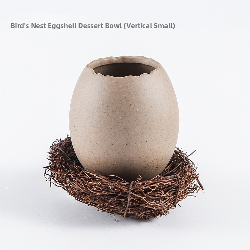 Portselanist magustoidu kauss strutsi kujundusega muna kujul, mikrolaineahi ei toimi