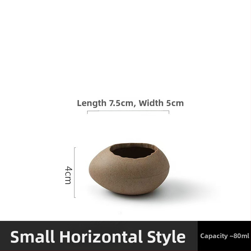 Portselanist magustoidu kauss strutsi kujundusega muna kujul, mikrolaineahi ei toimi