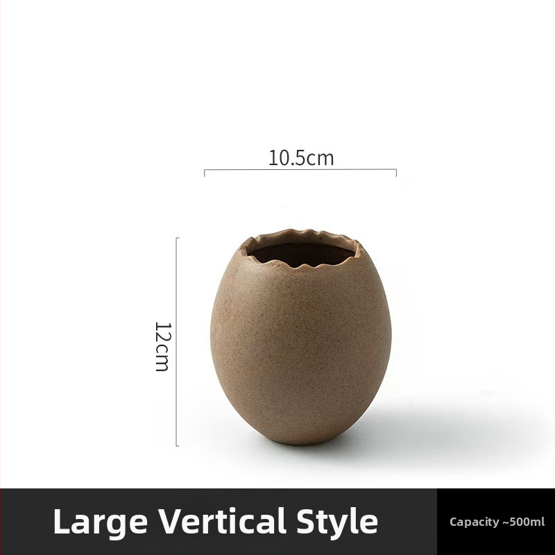 Portselanist magustoidu kauss strutsi kujundusega muna kujul, mikrolaineahi ei toimi