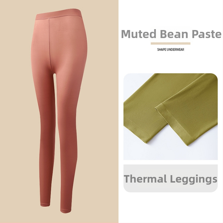 Moterų ultra plonas bešiuvas šilumos termo apatinių komplektas — ilgų rankovių viršūnė ir ilgoms kelnioms; anti‑statinis, kūno formavimas, hidracija hialurono rūgštimi; audinys: nailonas-spandeks (80–90% spandekso).