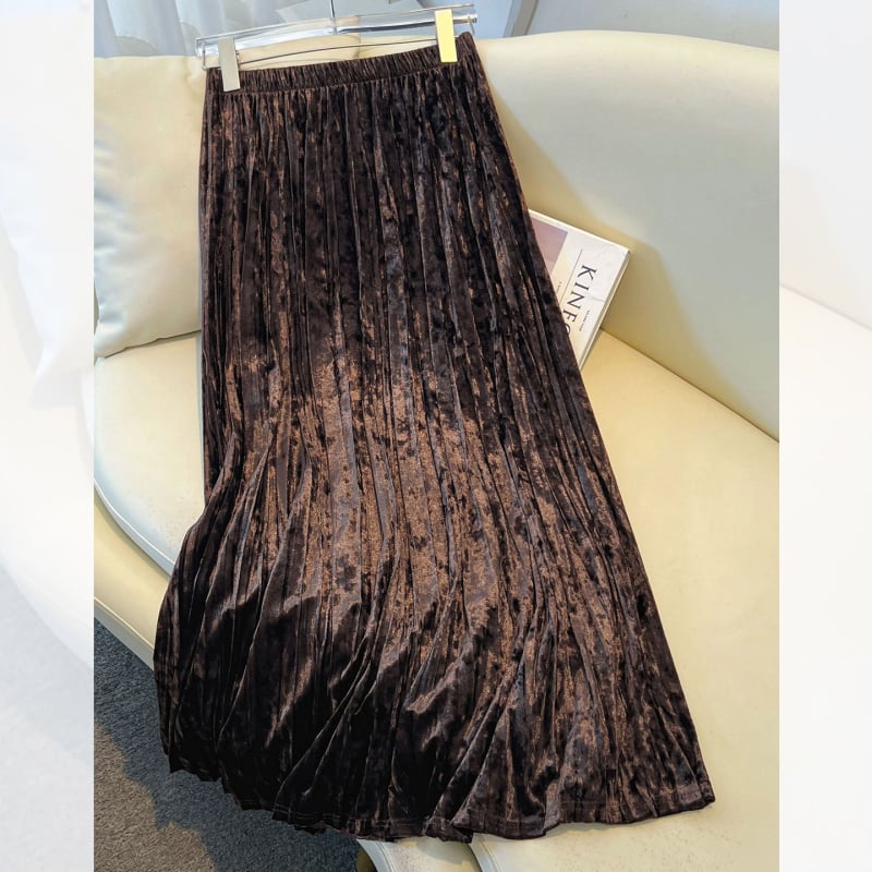 Плисирана пола с миди дължина, елегантен силует, полиестер-ацетатова смес (80–90% полиестер; <30% ацетат), микроеластичност, есенно-зимна колекция 2025