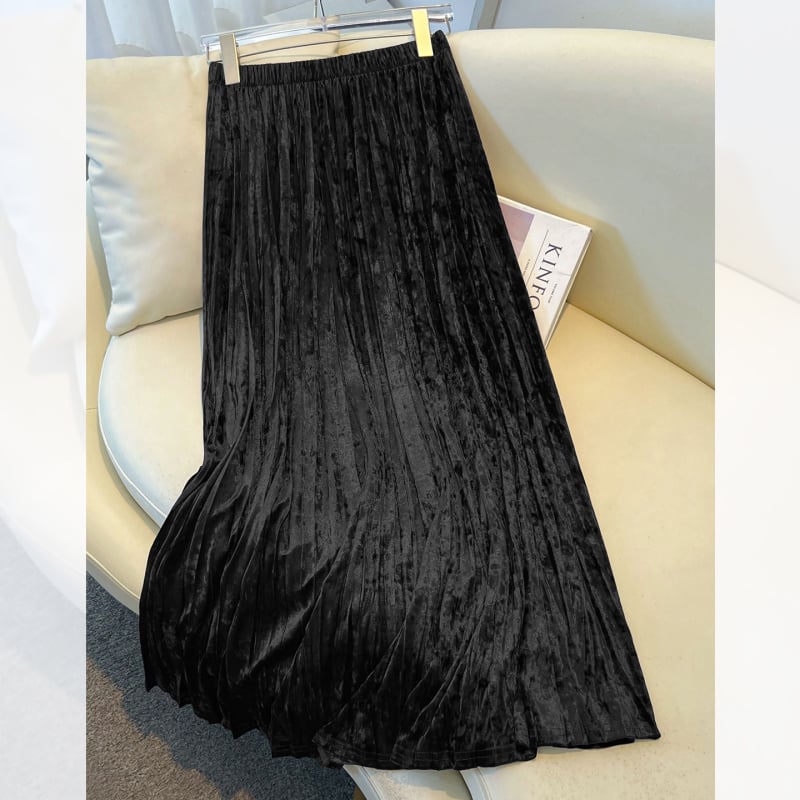 Плисирана пола с миди дължина, елегантен силует, полиестер-ацетатова смес (80–90% полиестер; <30% ацетат), микроеластичност, есенно-зимна колекция 2025