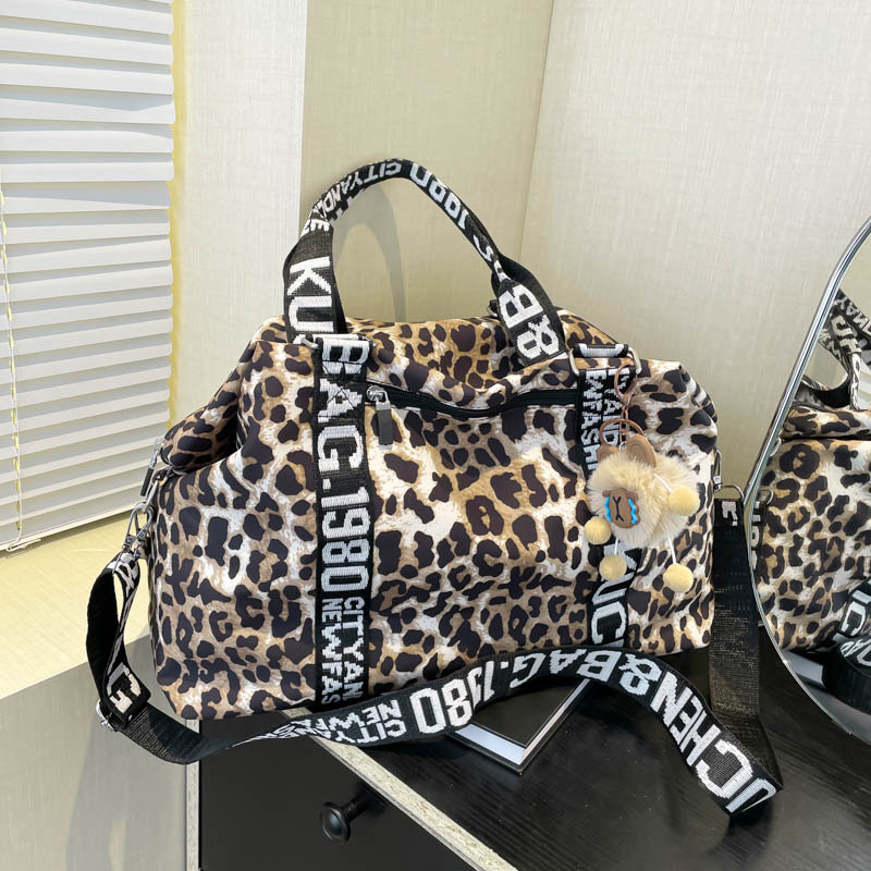 Чанта през рамо за пътуване с леопардов принт, капацитет 20–35 л, текстилна външна част, подплата от полиестер, за жени