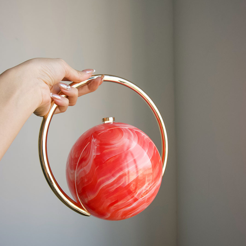 Akrüülkõrvakäekott marmormustriga, sfääriline õhtukott lukustusega, vooderita, sisemine dokumendikott