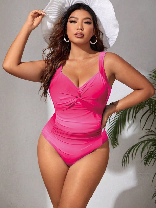 Едночастен бански за жени с принтова шарка; бързосъхнеща, високоеластична материя; полиестер 82% с подплата 95% полиестер; метална опора и подплънка за бюста; без ръкави.