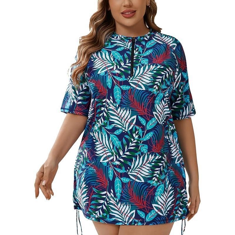 Naistele ujumistrikoo poole zip-iga, lühikeste varrukatega, veekindel, polüesterkangas, polüpropüleeni sisaldus, kolmekoseline komplekt