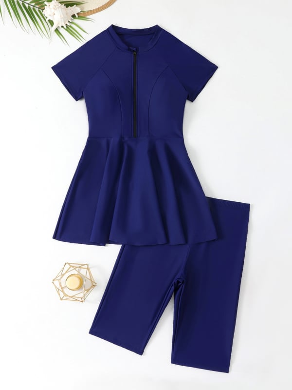 Женски двучастен плувен костюм с цип, UV защита, къс ръкав и плавки, консервативен дизайн; нейлон 82%, подплата полиестер-еластан 80%