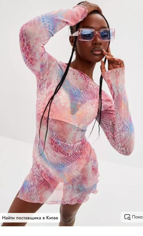 Rand-tunika võrgust materjalist, ümmarguse kaelusega, pikad varrukad, vaba vöökoht, seeliku pikkus