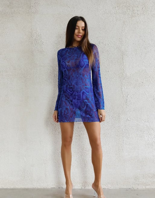 Rand-tunika võrgust materjalist, ümmarguse kaelusega, pikad varrukad, vaba vöökoht, seeliku pikkus